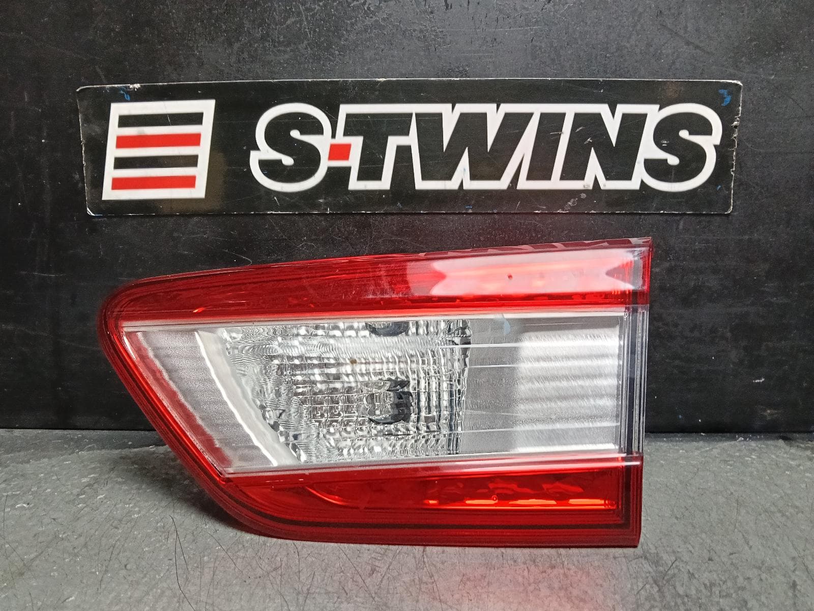 Used auto part listing image: 2018 SUBARU IMPREZA REAR GARNISH G5, TAILGATE LAMP (RH SIDE), W/ CHROME INSERT TYPE, 09/16-02/20 0000407515