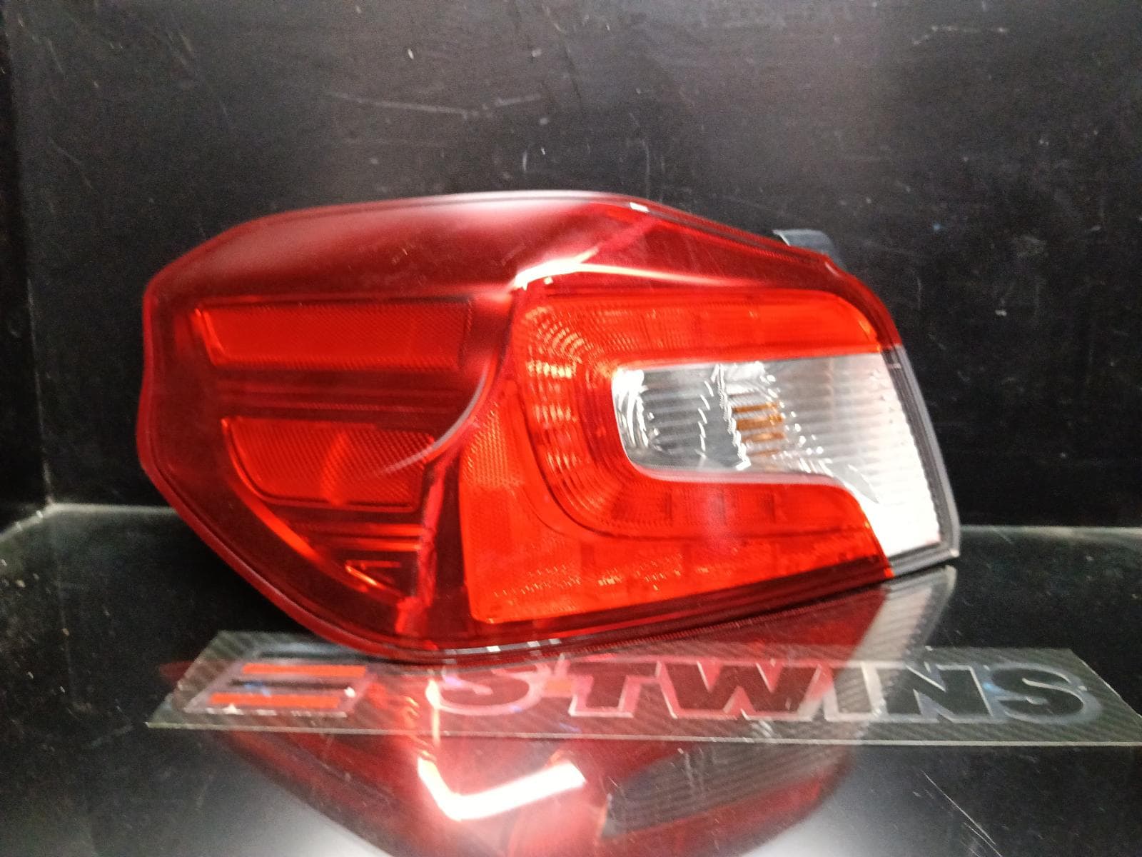 Used auto part listing image: 2017 SUBARU WRX LEFT TAILLIGHT V1, IN BODY, W/ CLEAR LENS TYPE, 03/14-10/21 0000406530