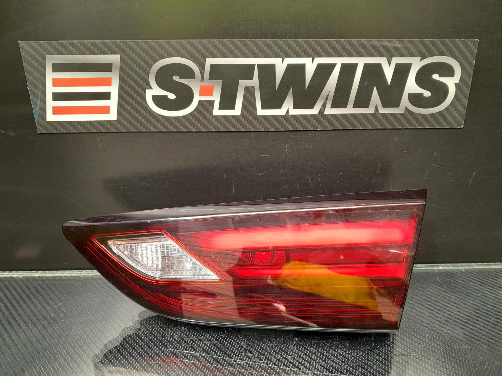 Used auto part listing image: 2018 HOLDEN ASTRA REAR GARNISH TAILGATE LAMP (RH SIDE), BK, 5DR HATCH, RS-V, LED TYPE, 09/16- 0000178465