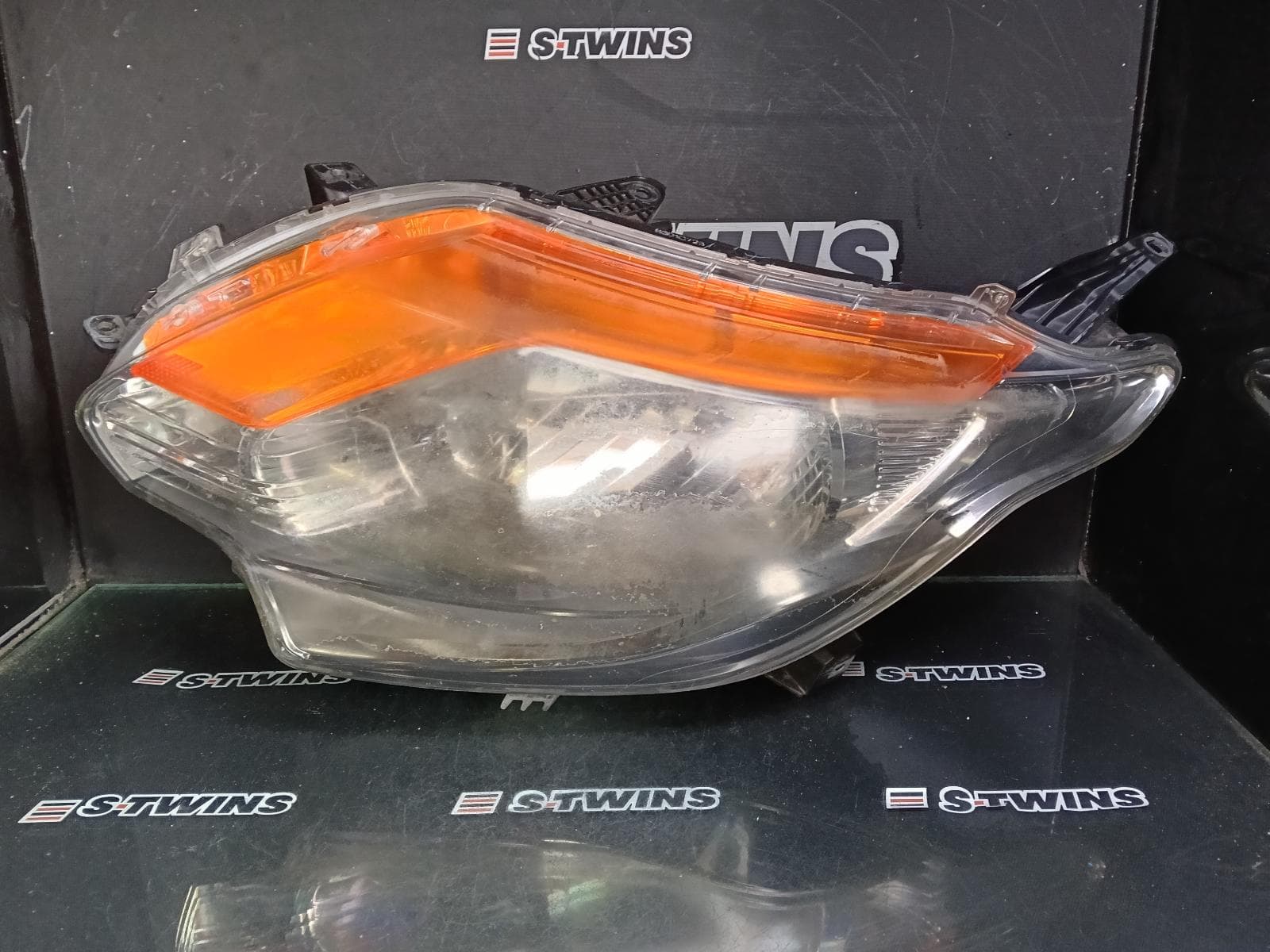 Used auto part listing image: 2017 MITSUBISHI TRITON LEFT HEADLAMP MQ, HALOGEN TYPE, BLACK INSERT, 03/15-10/18 0000411782