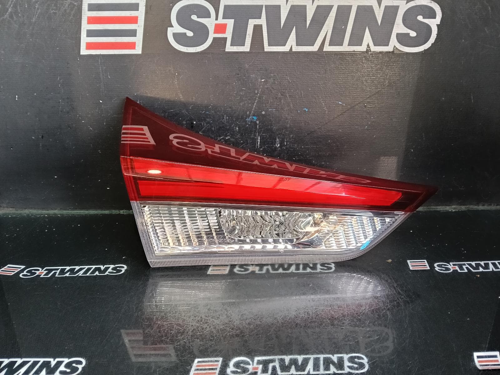 Used auto part listing image: 2015 TOYOTA COROLLA REAR GARNISH TAILGATE LAMP (LH SIDE), ZRE182R/ZWE186R, HATCH, 03/15-06/18 0000411980
