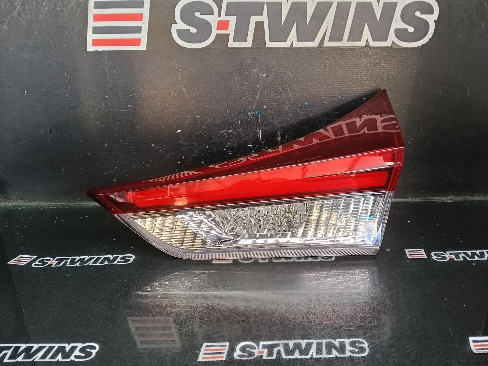 Used auto part listing image: 2015 TOYOTA COROLLA REAR GARNISH TAILGATE LAMP (RH SIDE), ZRE182R/ZWE186R, HATCH, 03/15-06/18 0000411981