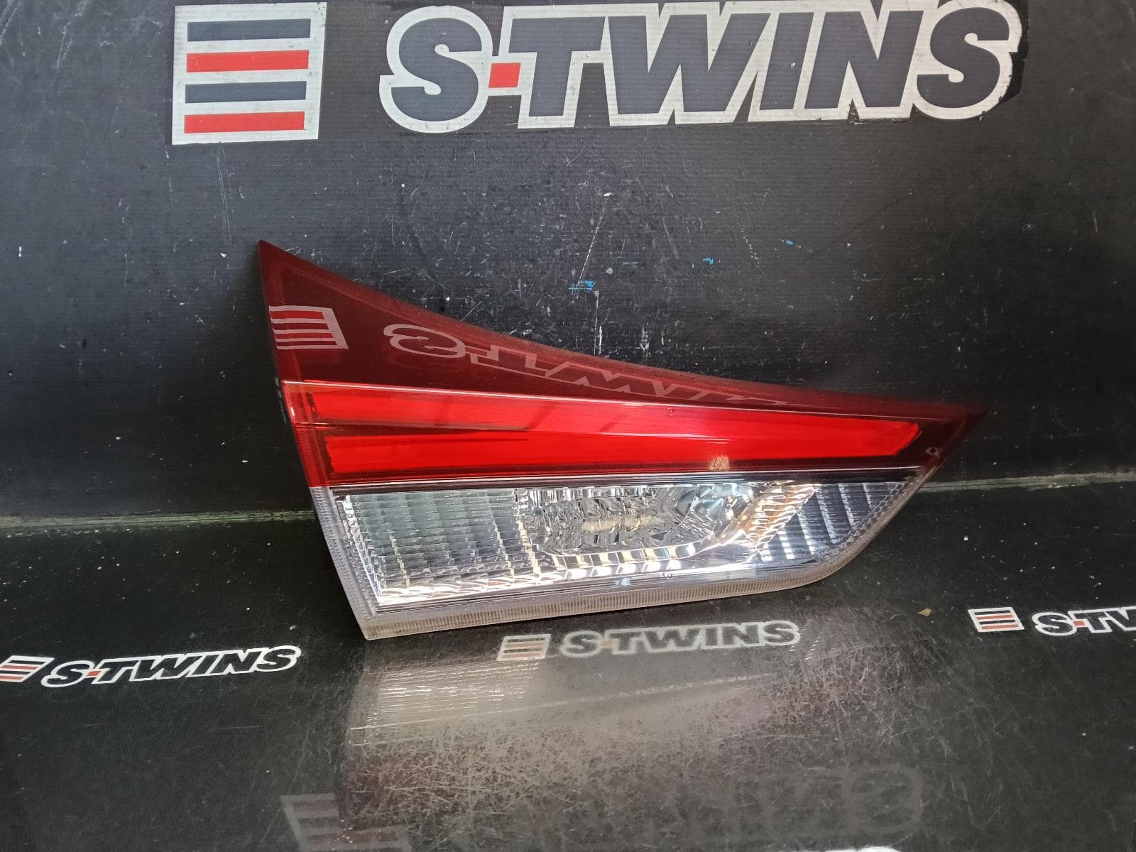 Used auto part listing image: 2015 TOYOTA COROLLA REAR GARNISH TAILGATE LAMP (LH SIDE), ZRE182R/ZWE186R, HATCH, 03/15-06/18 0000412168