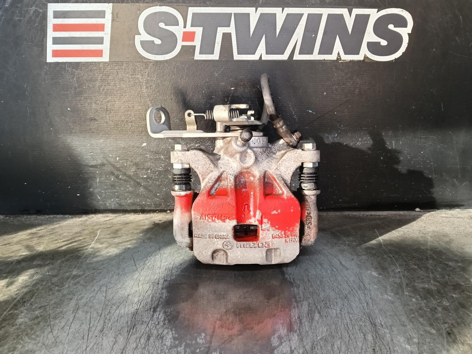 Used auto part listing image: 2015 MAZDA 3 CALIPER LH REAR, MANUAL HANDBRAKE TYPE, BM-BN, 06/13-02/19 0000412909