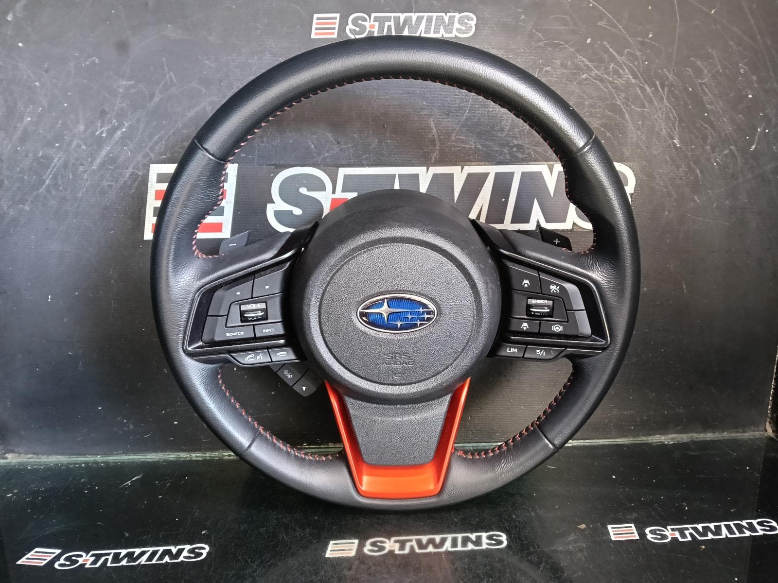 Used auto part listing image: 2022 SUBARU FORESTER STEERING WHEEL SK, W/ Si-DRIVE, ORANGE INSTERT, ORANGE STITCHING, 09/20-11/24 0000414932