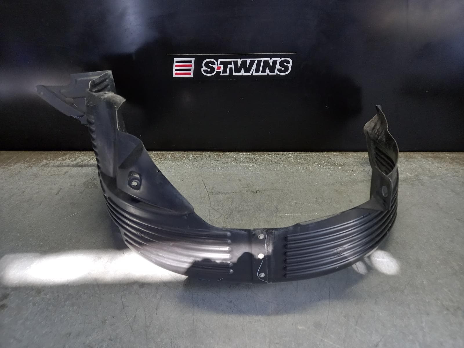 Used auto part listing image: 2014 HYUNDAI I20 LEFT GUARD LINER FRONT, PB, 03/12-12/15 0000261283