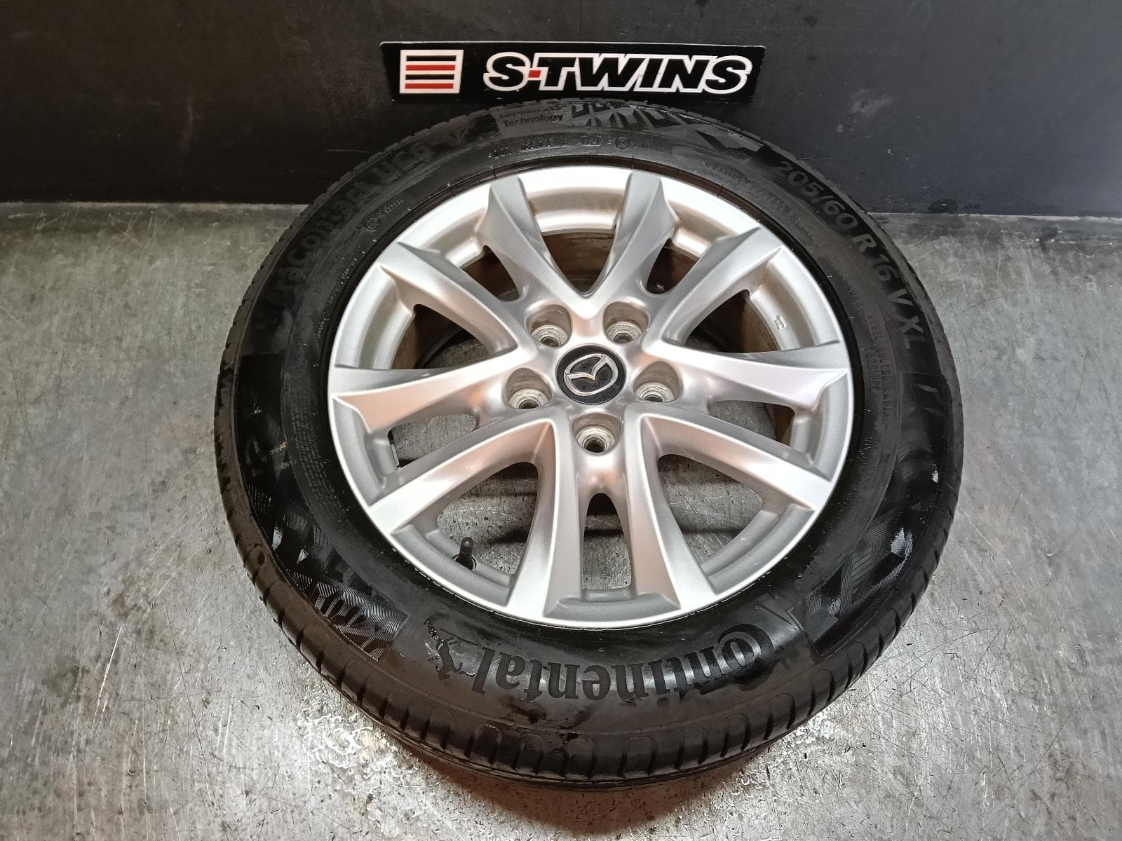 Used auto part listing image: 2015 MAZDA 3 WHEEL MAG FACTORY, 16X6.5IN, BM-BN, MAXX/TOURING, 11/13-02/19 0000415632