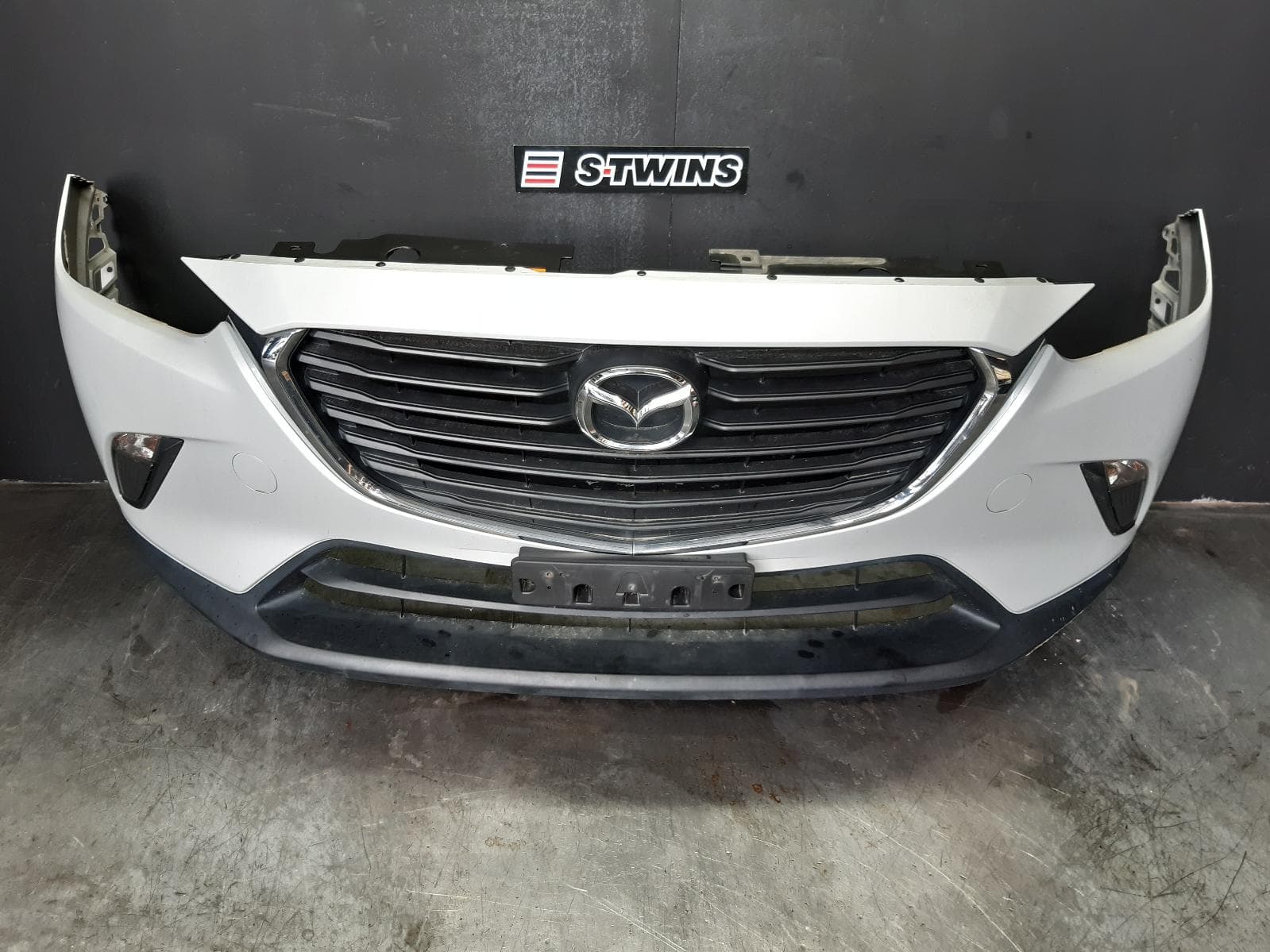 Used auto part listing image: 2017 MAZDA CX3 FRONT BUMPER BUMPER BAR, DK, NON PARK SENSOR TYPE, 03/15- 0000365114