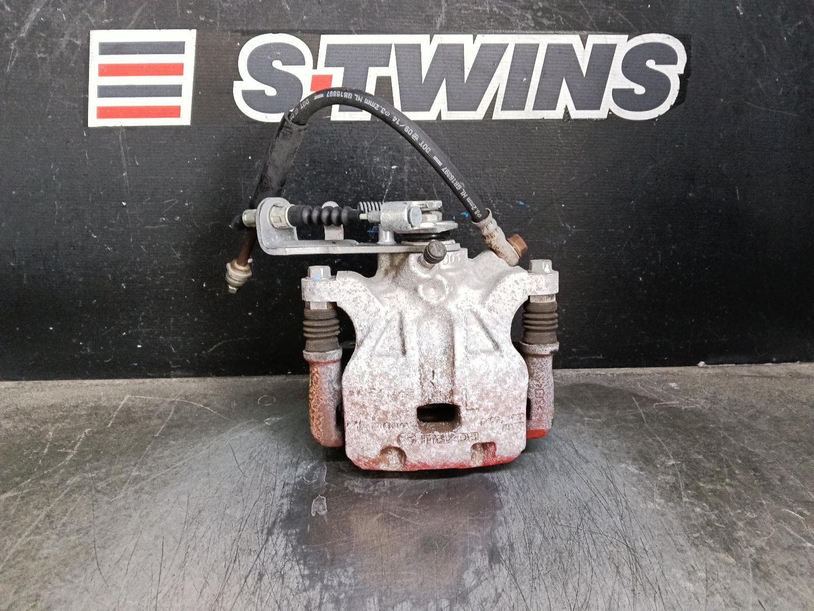 Used auto part listing image: 2014 MAZDA 3 CALIPER LH REAR, MANUAL HANDBRAKE TYPE, BM-BN, 06/13-02/19 0000415997