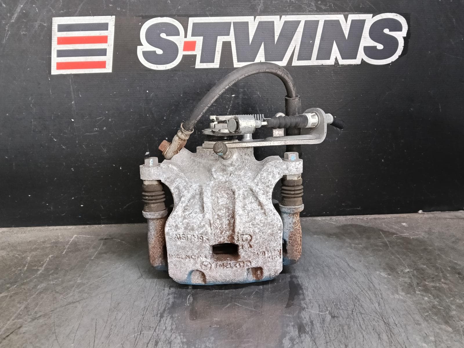 Used auto part listing image: 2014 MAZDA 3 CALIPER RH REAR, MANUAL HANDBRAKE TYPE, BM-BN, 06/13-02/19 0000415996