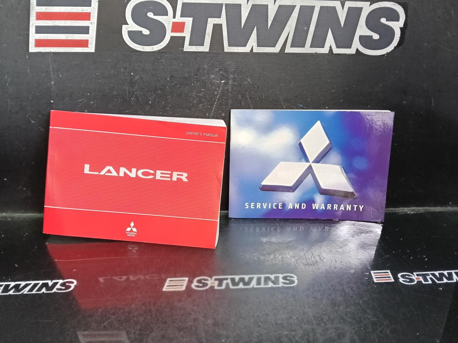 Used auto part listing image: 2009 MITSUBISHI LANCER OWNERS HANDBOOK CJ, 07/07-10/15 0000416023