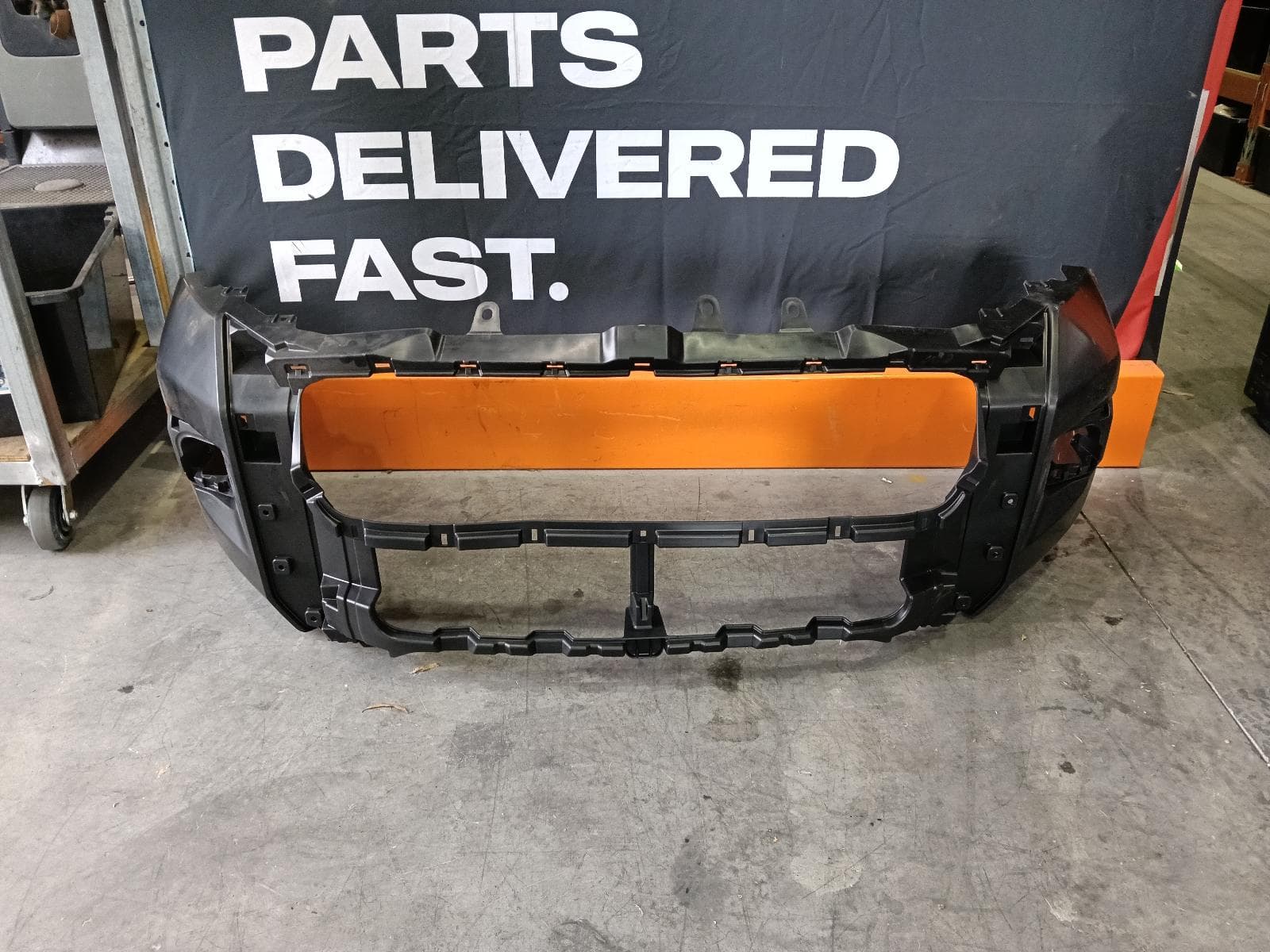 Used auto part listing image: NEW GENUINE 2022 TOYOTA HILUX FRONT BUMPER BUMPER BAR, ROGUE/SR5 CRUISER, 08/20-09/25 0000416166