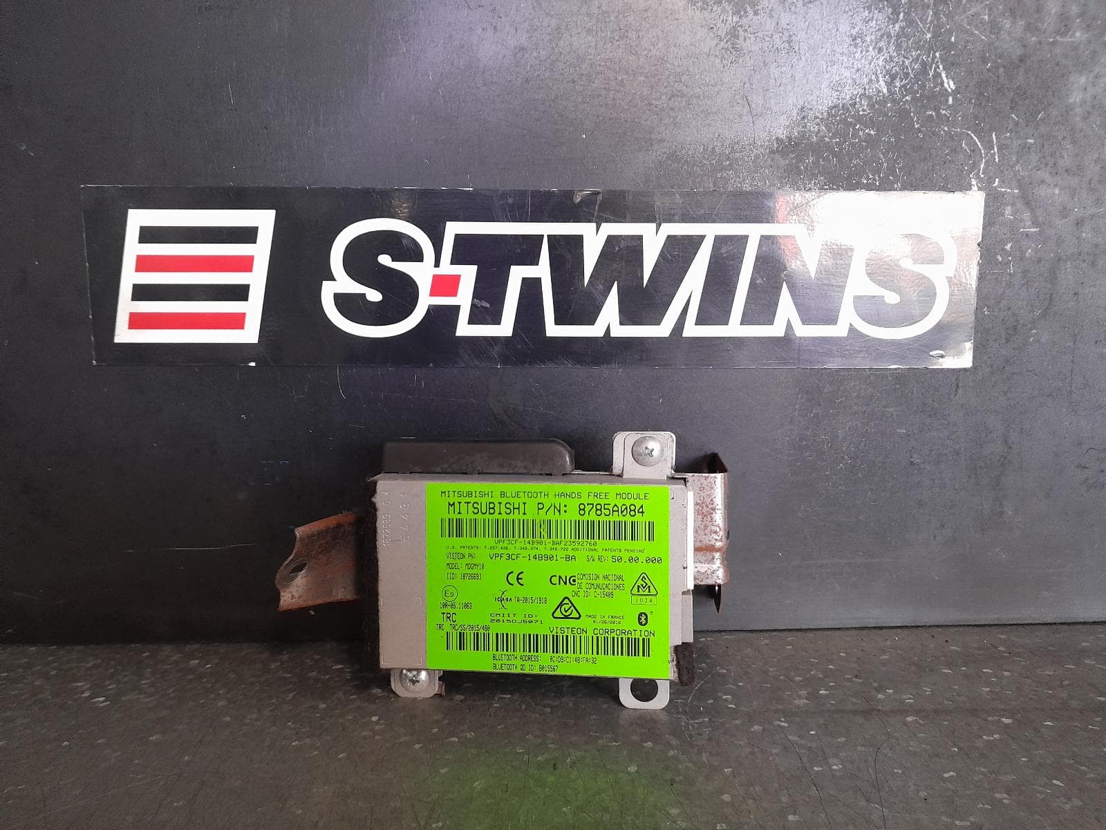 Used auto part listing image: 2016 MITSUBISHI TRITON BLUETOOTH HANDS FREE MODULE, P/N 8785A076 (MOUNTED BEHIND GLOVE BOX), 01/15-12/17 0000341591
