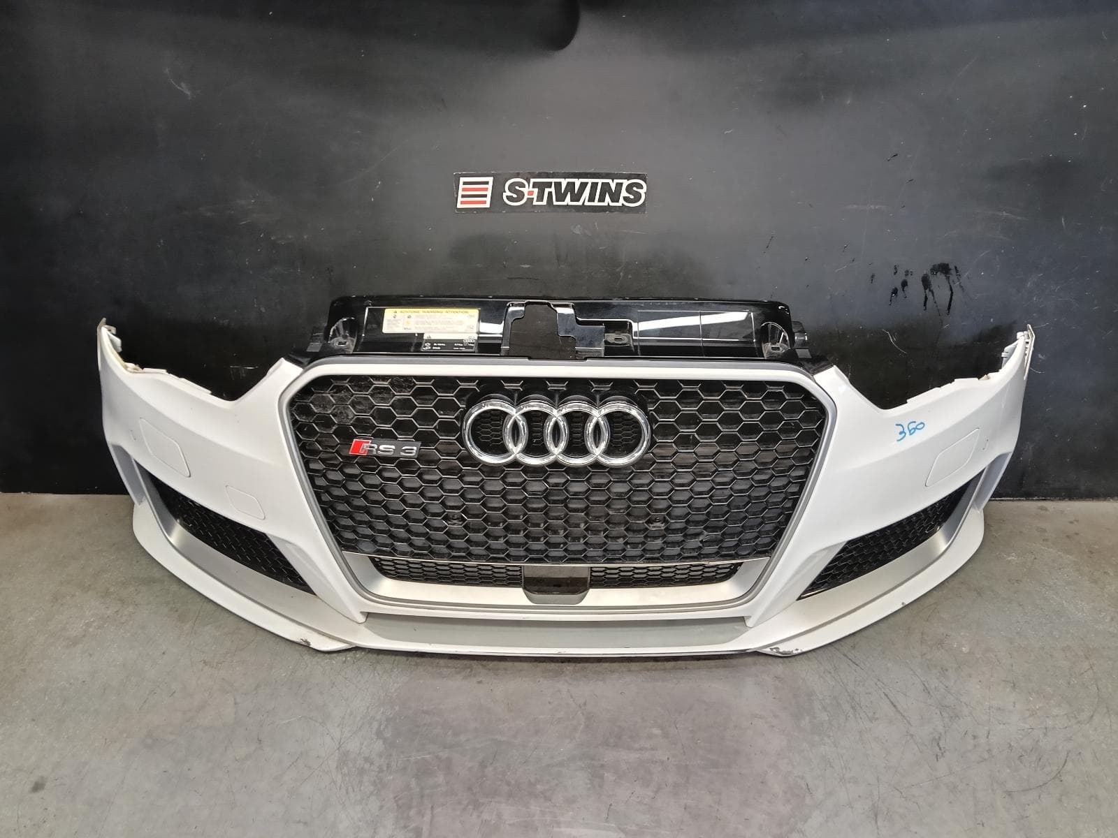 Used auto part listing image: 2016 AUDI A3 FRONT BUMPER 8V, RS3, HATCH, W/ PARK SENSOR & H/LAMP WASHER TYPE, 10/15-10/17 0000421503