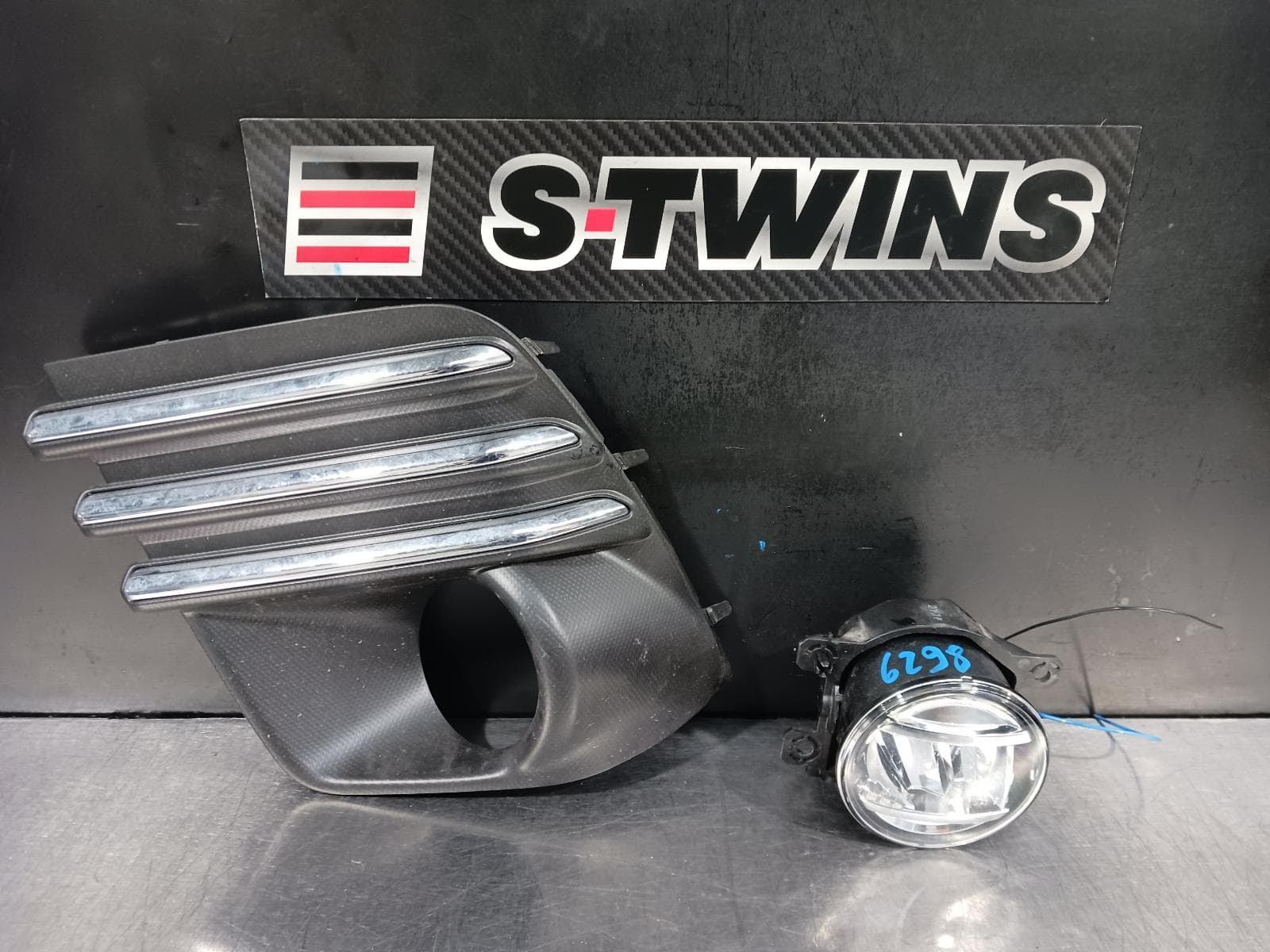 Used auto part listing image: 2022 SUBARU FORESTER SK, BUMPER FOGLAMP SURROUND, W/ CHROME INSERTS, 09/21-11/24 0000222824