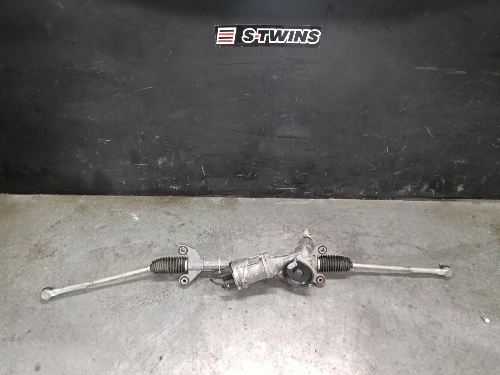 Used auto part listing image: 2017 SUBARU WRX STEERING BOX RACK V1, P/N 34110VA020, WRX, 05/15-04/17 0000422171