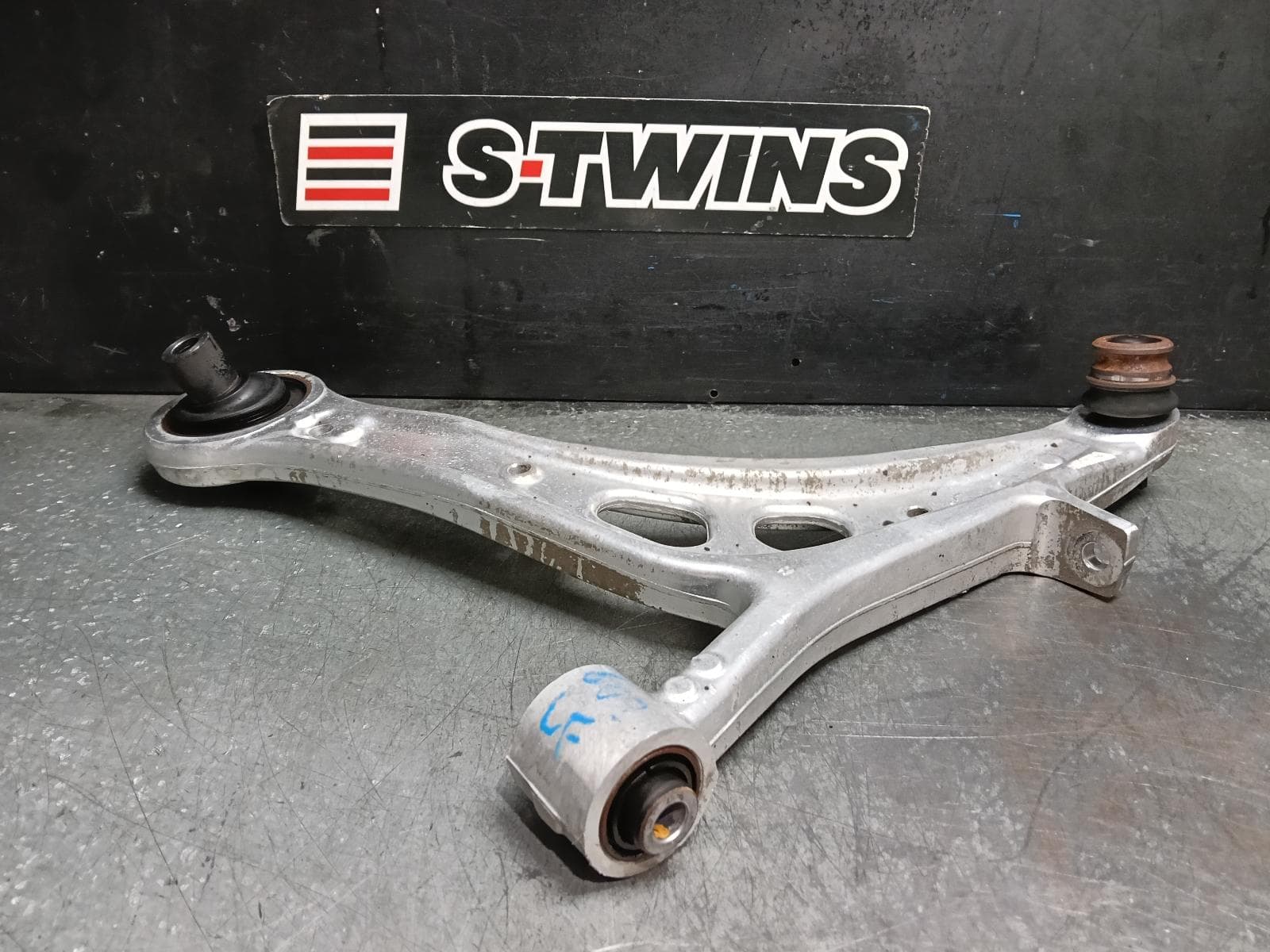 Used auto part listing image: 2017 SUBARU WRX LEFT FRONT LOWER CONTROL ARM V1, 03/14-10/21 0000422186