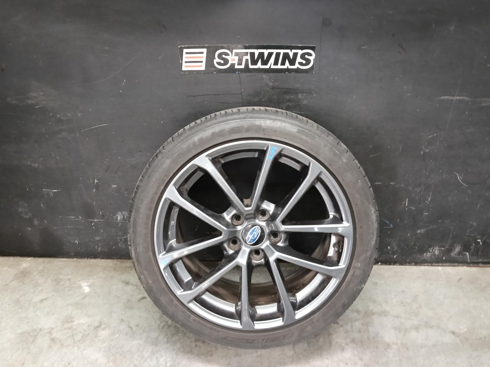 Used auto part listing image: 2017 SUBARU WRX WHEEL MAG FACTORY, 5 V SPOKE, 18X8.5IN, BLACK CHROME, V1, 03/14-10/21 0000422183