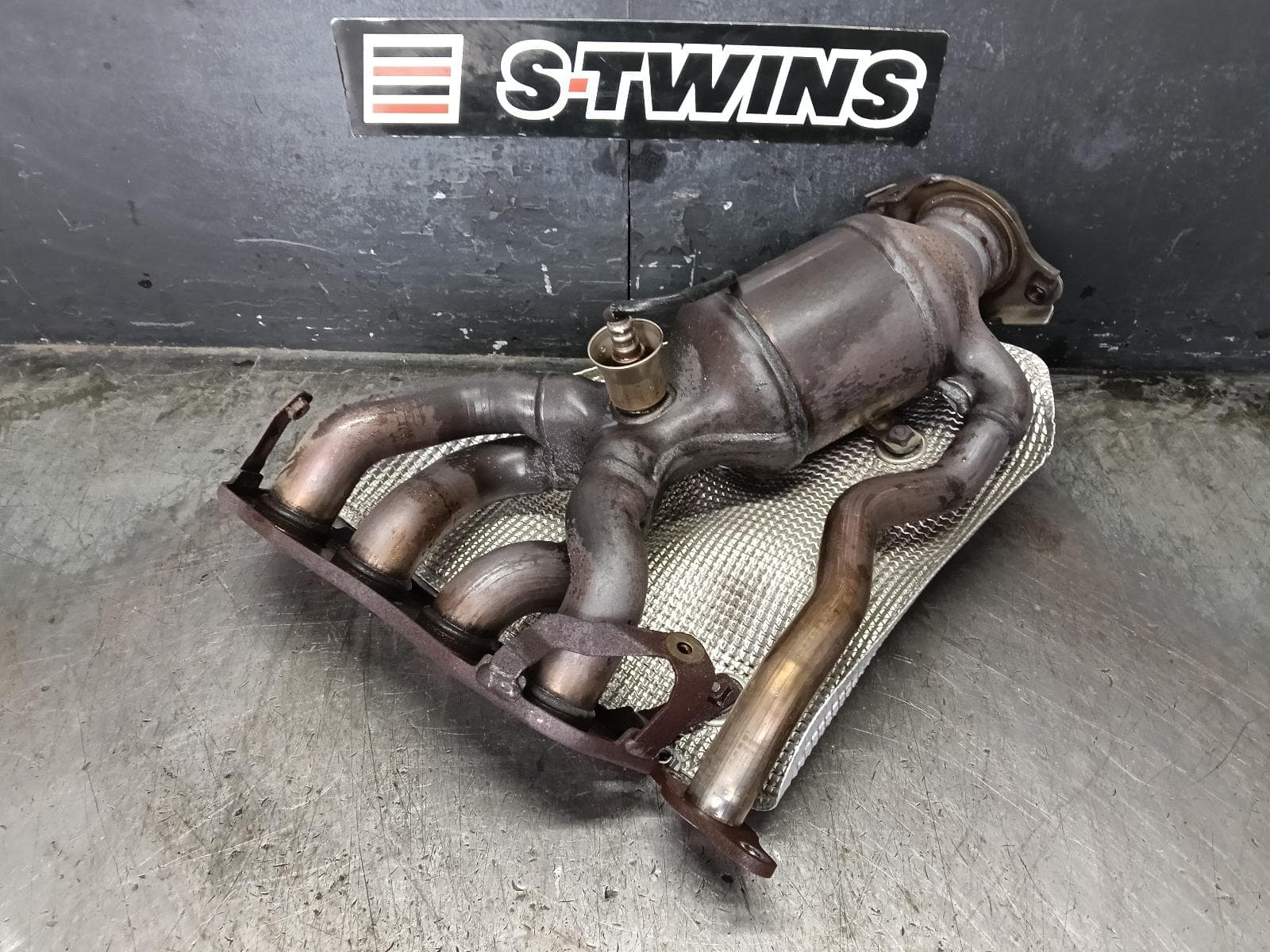 Used auto part listing image: 2018 TOYOTA COROLLA CATALYTIC CONVERTER MANIFOLD-CAT TYPE, 2.0, PETROL, MZEA12R, 07/18- 0000423124