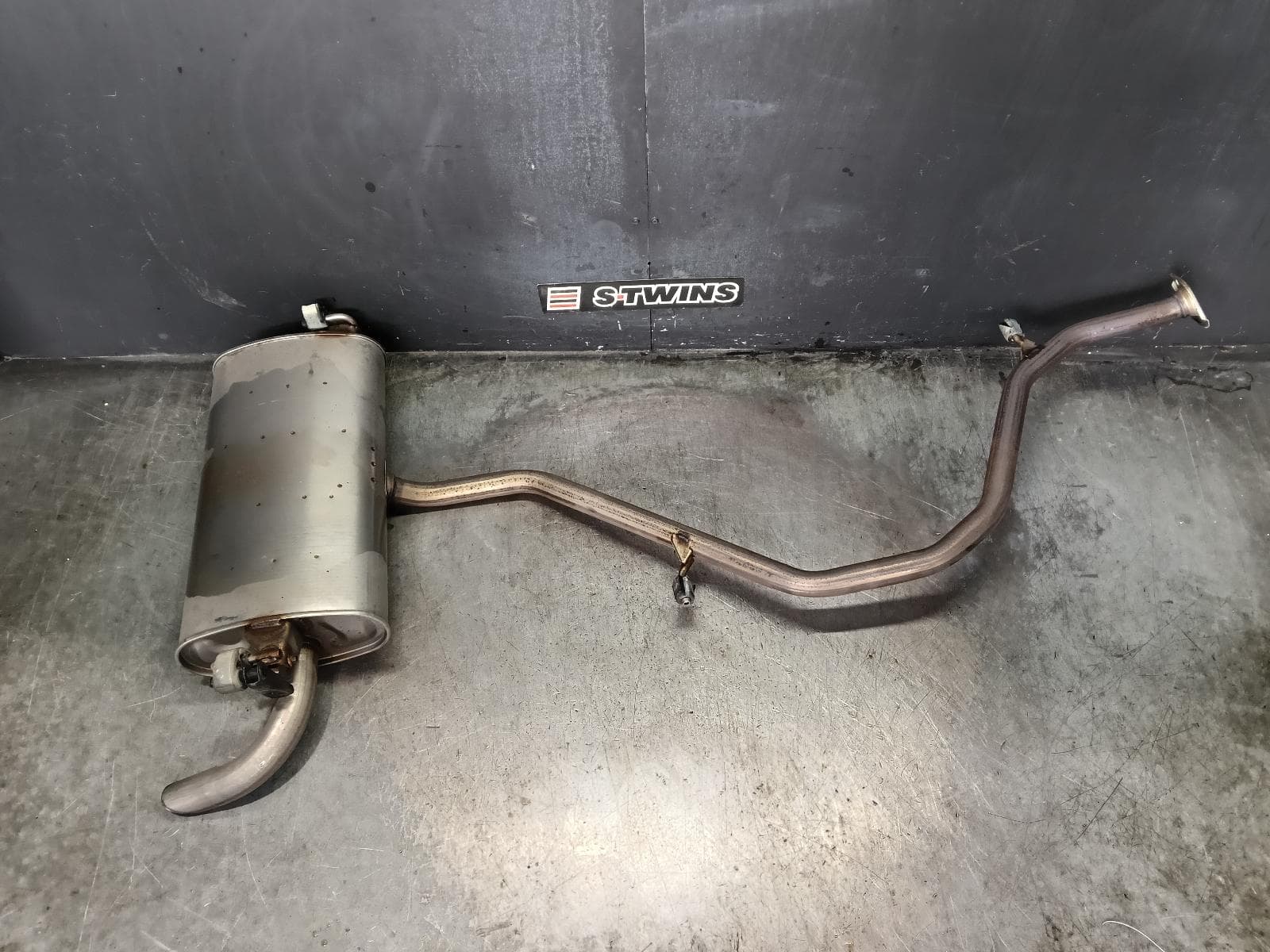 Used auto part listing image: 2018 TOYOTA COROLLA MUFFLER E210, 07/18- 0000423125