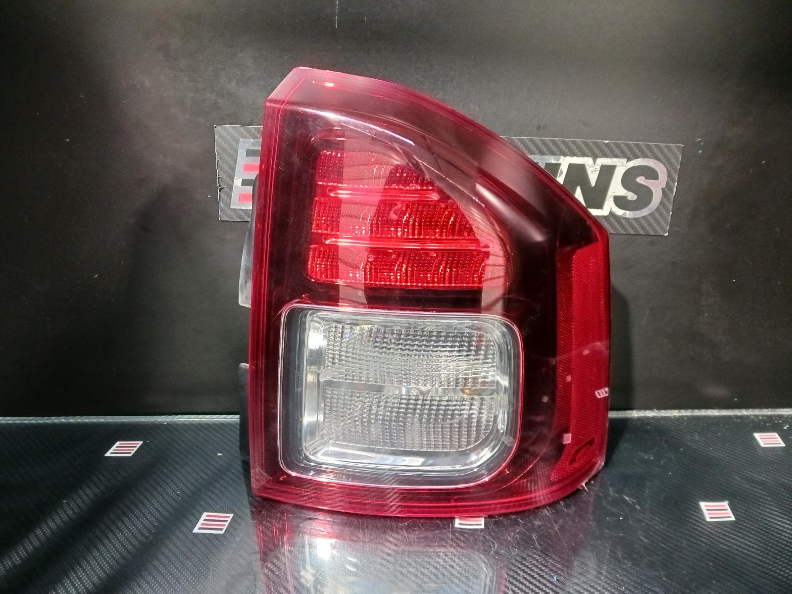 Used auto part listing image: 2014 JEEP COMPASS RIGHT TAILLIGHT MK, IN BODY, SMOKED BEZEL, 07/13-12/16 0000216002