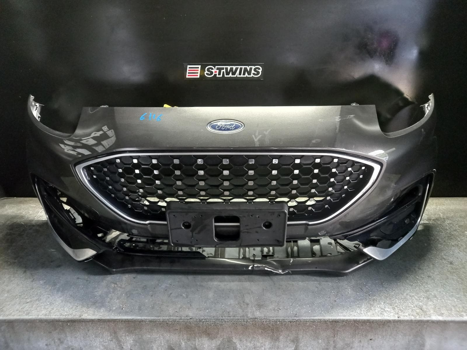 Used auto part listing image: 2021 FORD PUMA FRONT BUMPER JK, BUMPER BAR, ST-LINE/ST-LINE V, W/ PARK SENSOR TYPE, 03/20- 0000261046