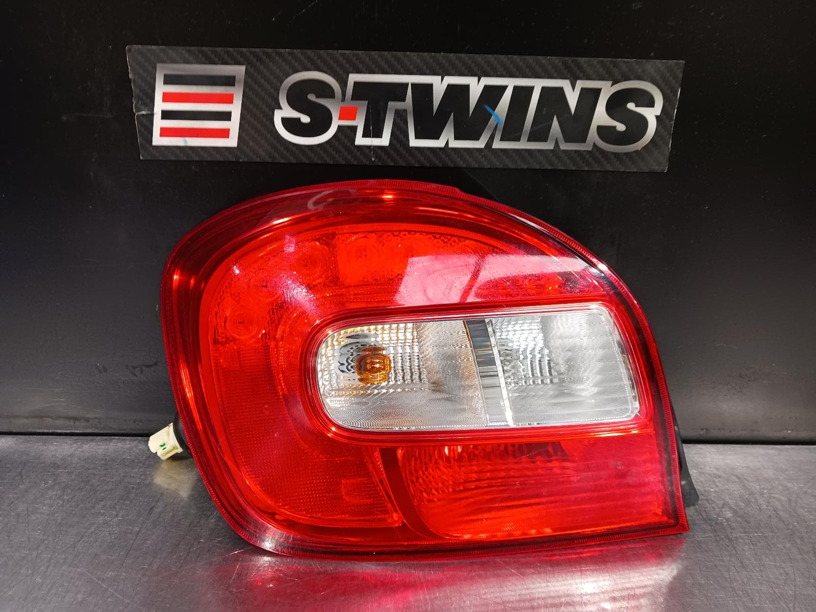 Used auto part listing image: 2022 SUZUKI BALENO LEFT TAILLIGHT EW, IN BODY, DOUBLE CLEAR TYPE, 04/16-12/22 0000245659