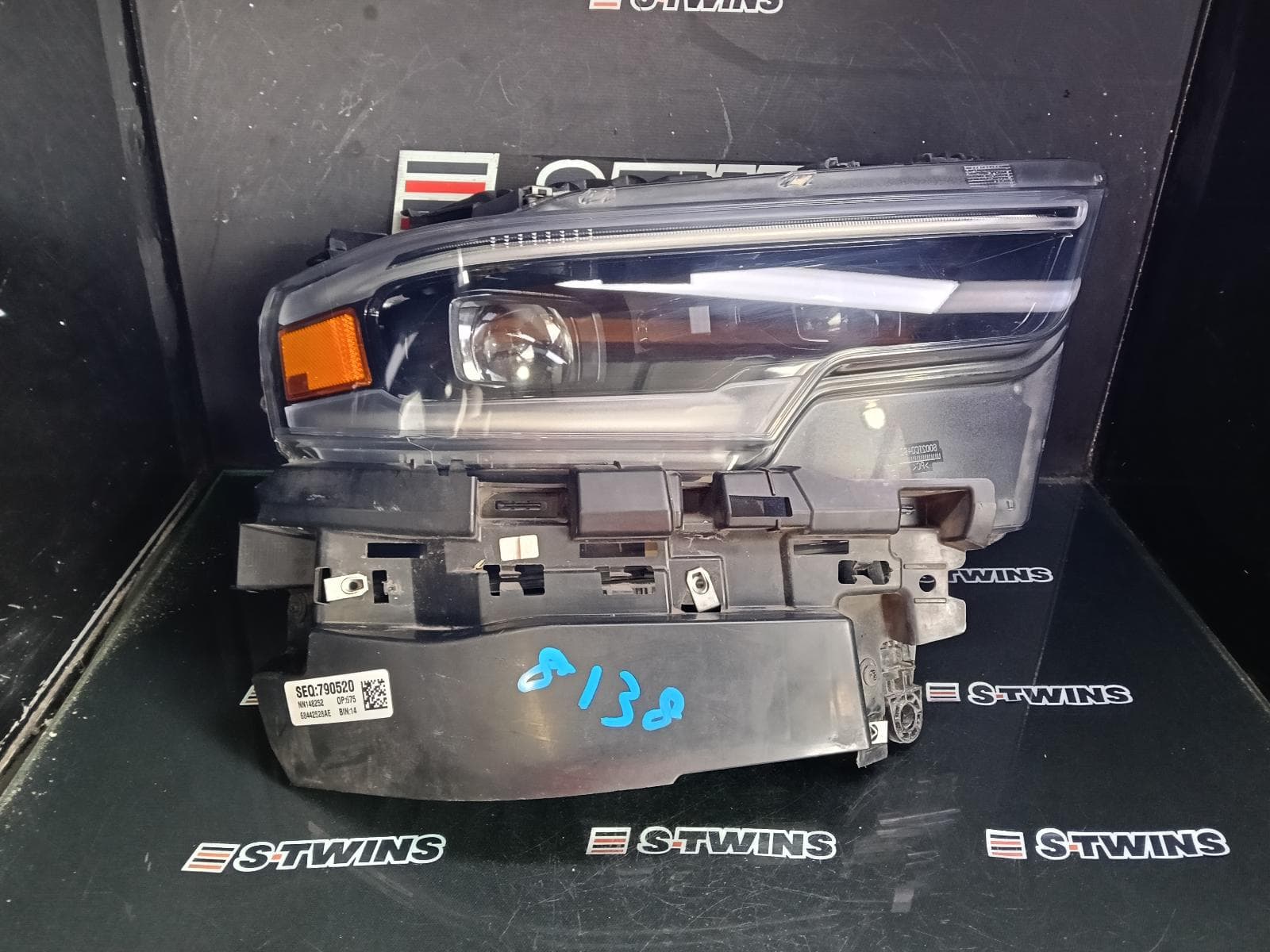 Used auto part listing image: 2022 RAM 1500 RIGHT HEADLAMP DT, W/ LED, PROJECTOR, DAYTIME RUNNING LAMP TYPE, 10/20-12/23 0000358295