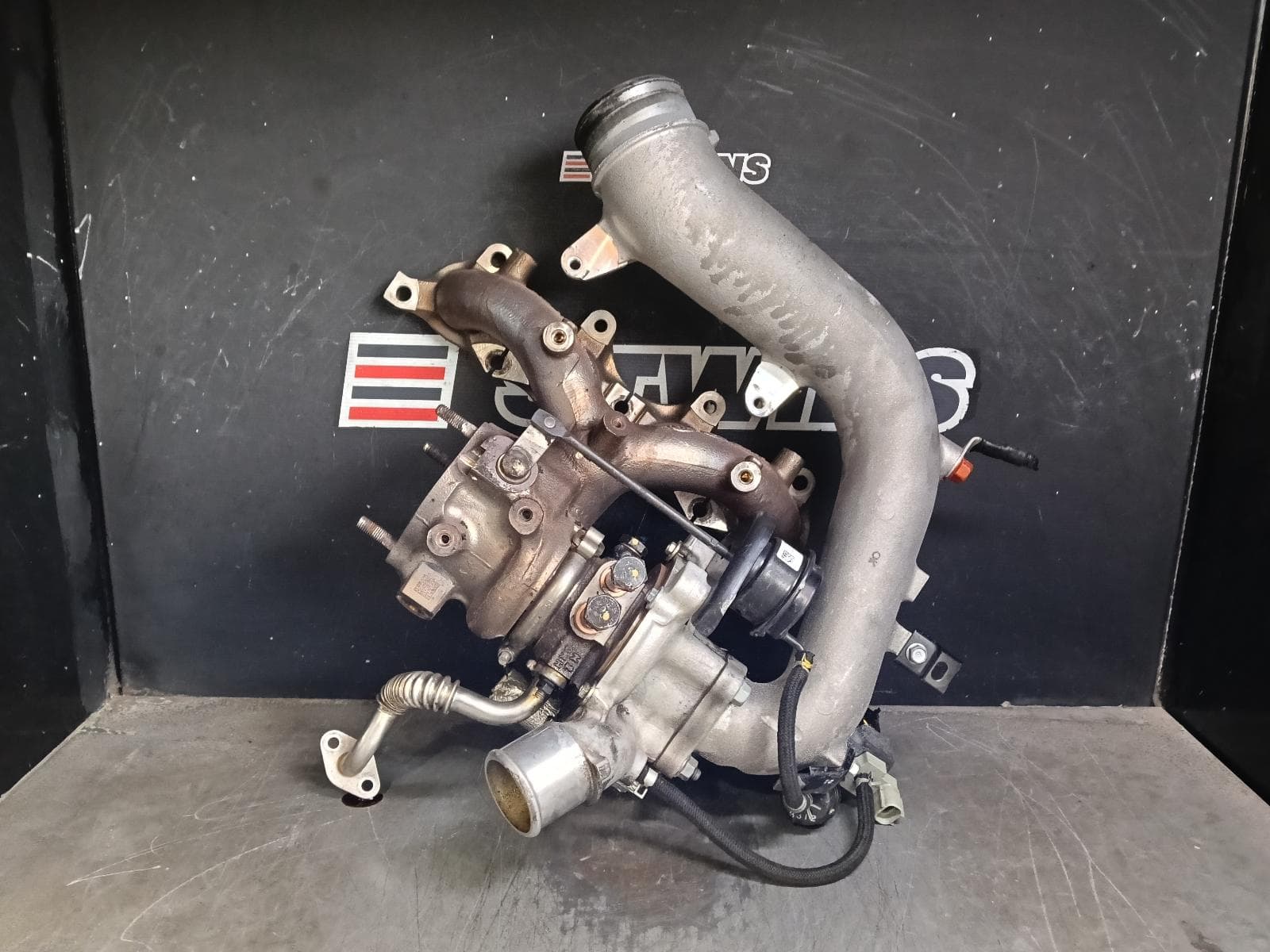 Used auto part listing image: 2022 HYUNDAI I30 TURBOCHARGER TURBO W/ MANIFOLD ASSY, PETROL, 1.6, G4FJ, PD, HATCH (S. KOREA VIN KMHH), 03/17-12/23 0000407348