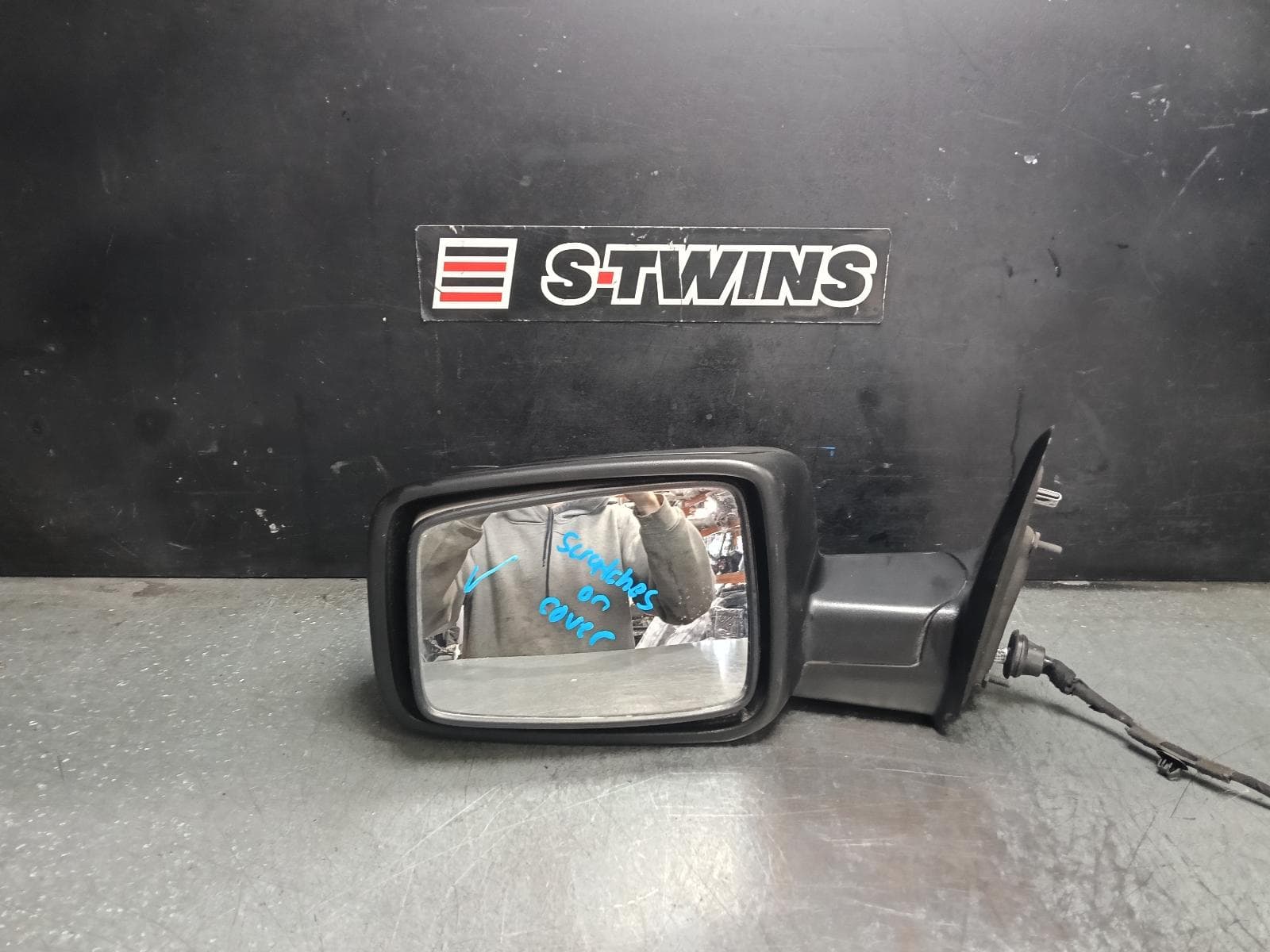 Used auto part listing image: 2021 RAM 1500 LEFT DOOR MIRROR DS, BLACK, MANUAL FOLD, HEATED TYPE, 11/17-12/23