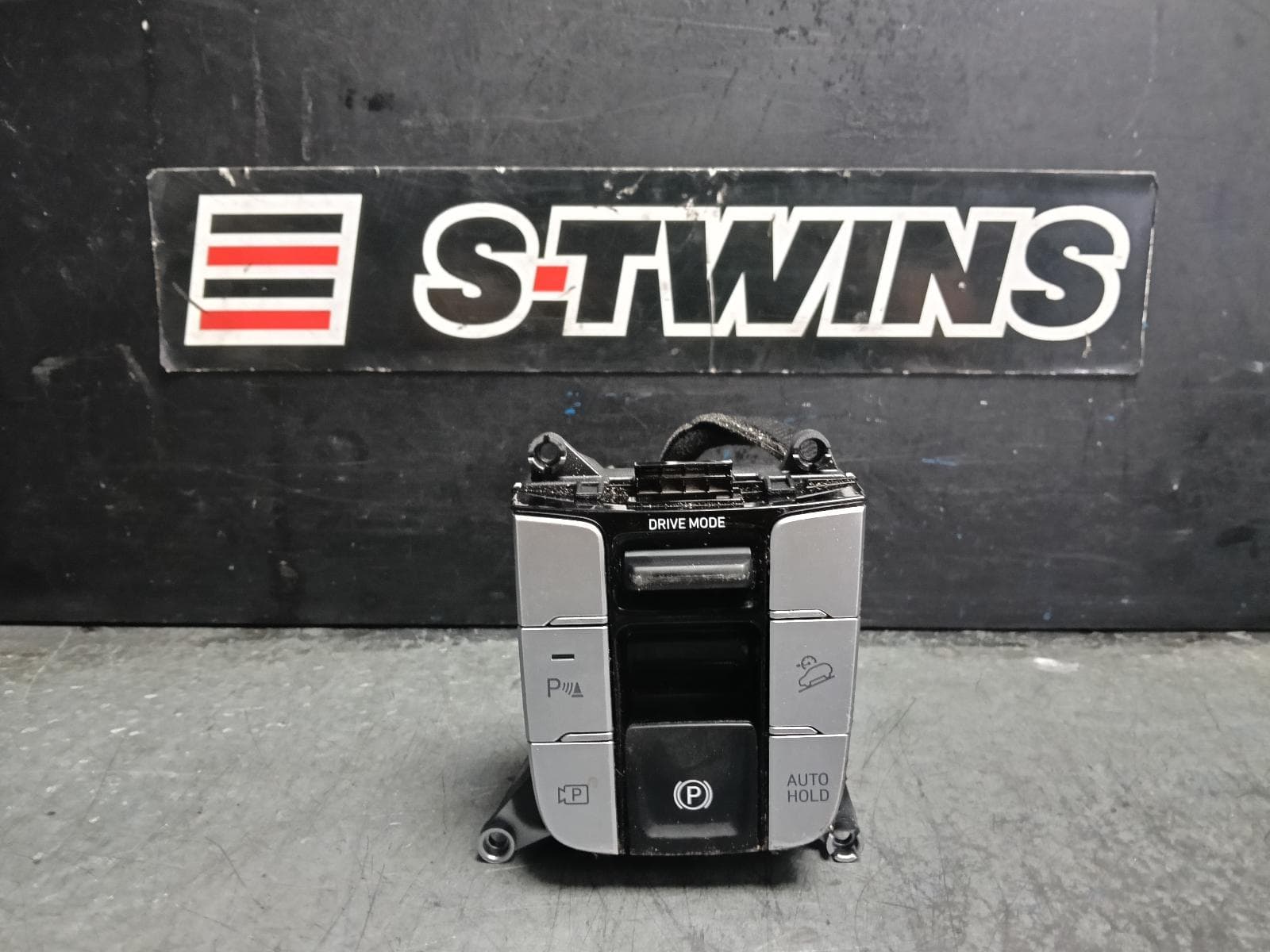 Used auto part listing image: 2022 HYUNDAI TUCSON ELEC PARK BRAKE SWITCH, W/ DRIVES MODES, SILVER, NX4, 02/21