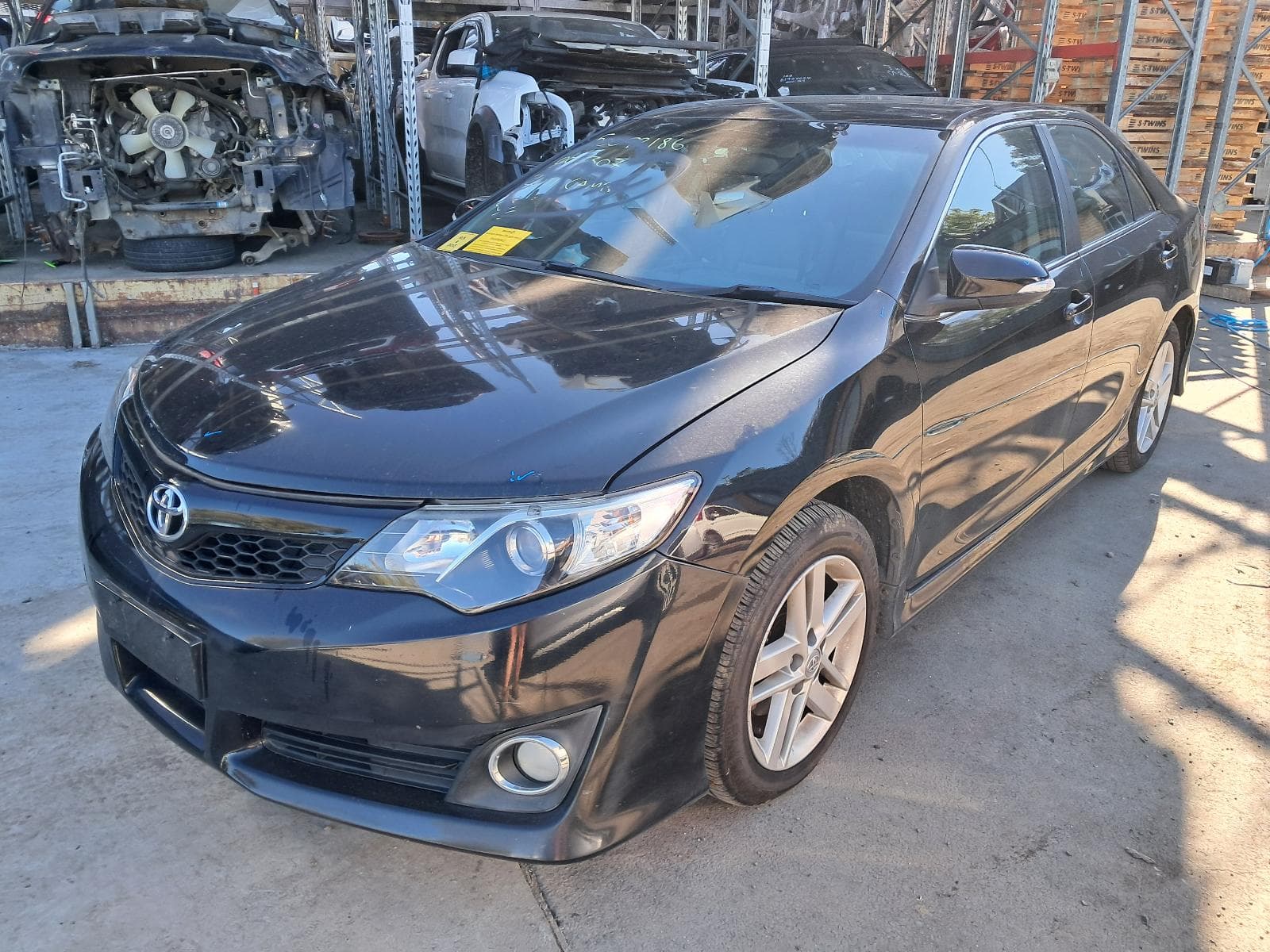 Featured wrecking vehicle: 2012 TOYOTA CAMRY (stock 11130)
