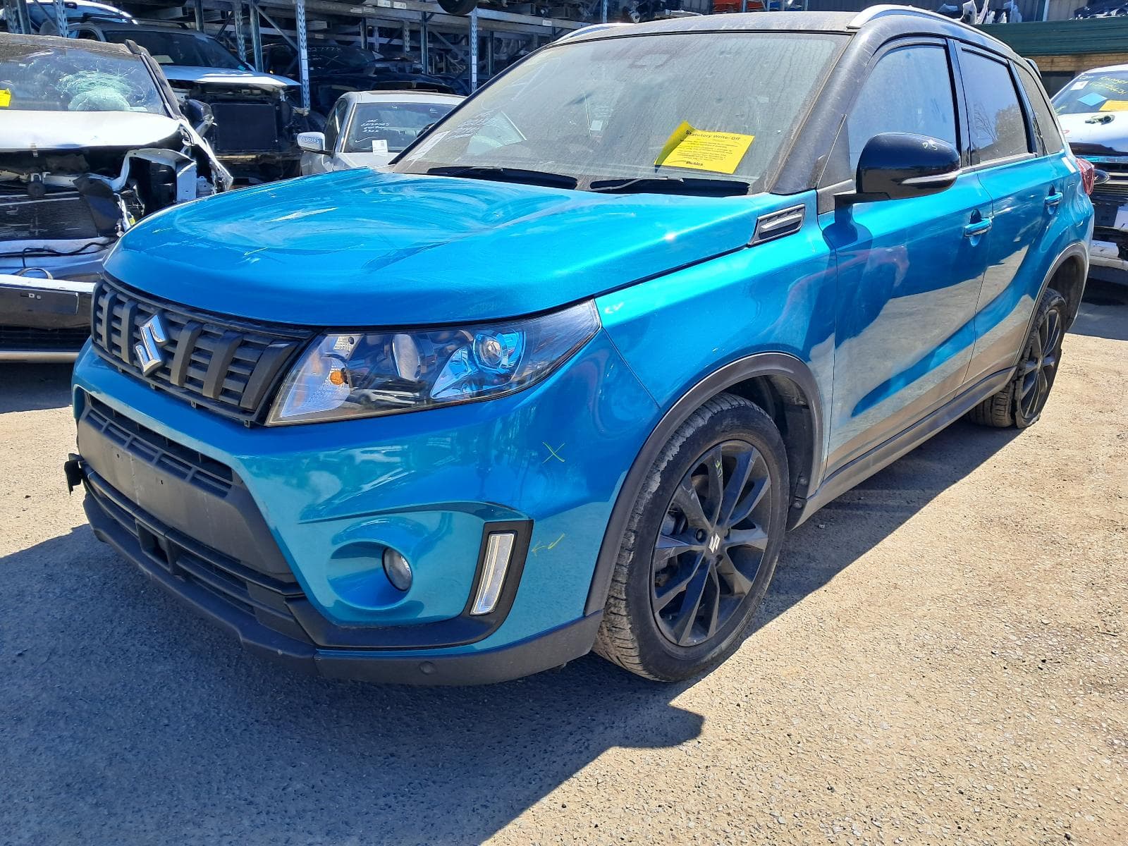 Used auto part listing image: 2023 SUZUKI VITARA FUEL DOOR FILLER VITARA, LY (VIN TSM), FUEL FLAP, 06/15