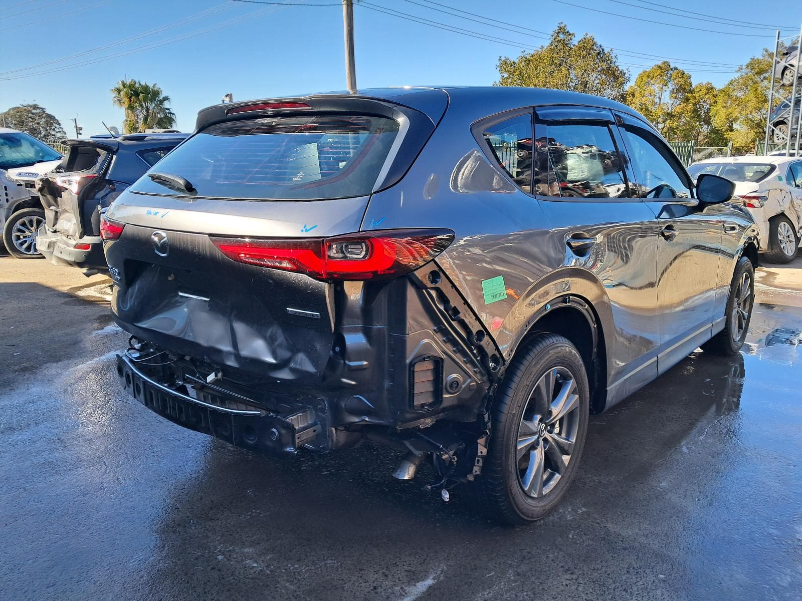 Used auto part listing image: 2025 MAZDA CX60 LEFT TAILLIGHT KH, IN BODY, 04/22