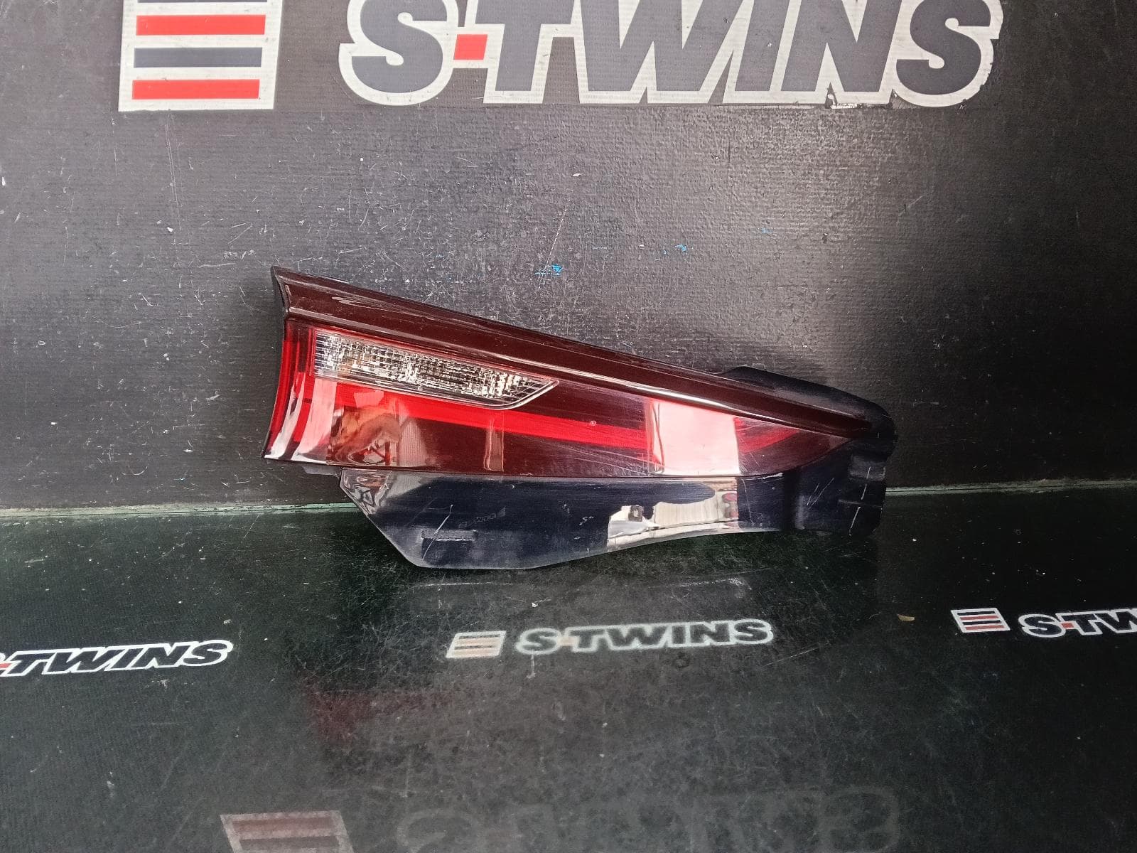Used auto part listing image: 2020 MAZDA CX30 REAR GARNISH TAILGATE LAMP (LH SIDE), W/ LED, TINTED TYPE, DM, 10/19