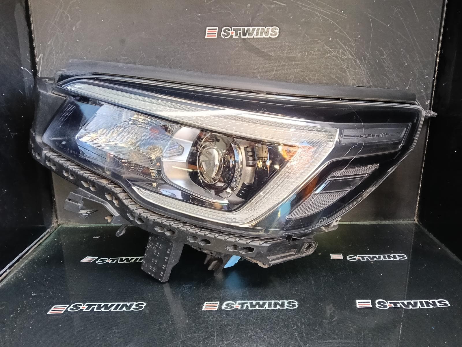 Used auto part listing image: 2020 SUBARU FORESTER LEFT HEADLAMP SK, W/ LED TYPE, W/ BLACK INSERT, 09/20-08/21 0000410553