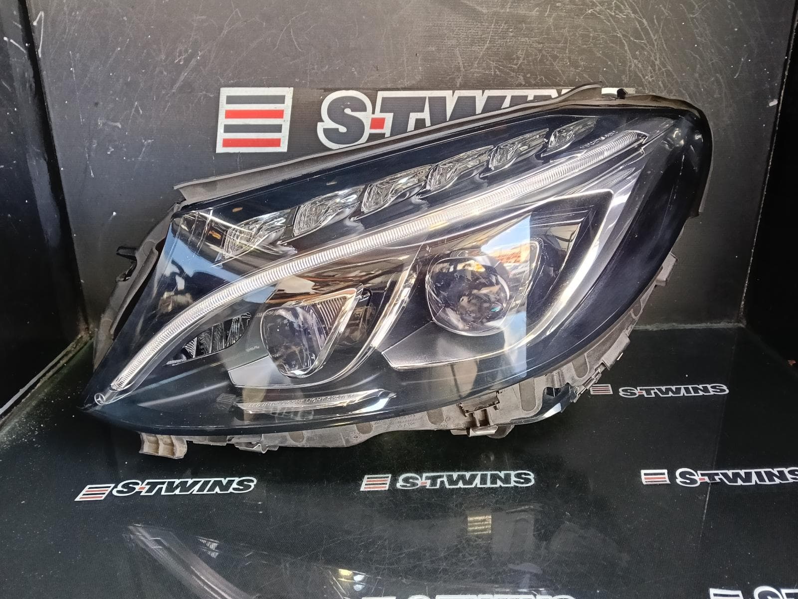 Used auto part listing image: 2017 MERCEDES C CLASS LEFT HEADLAMP W205/S205, LED TYPE, ADAPTIVE, DUAL PROJECTOR, 06/14-07/18 0000396239