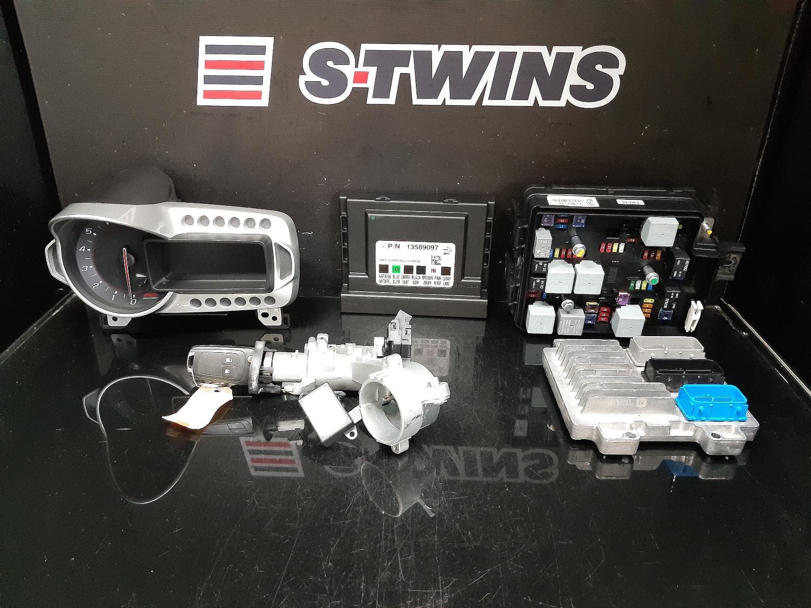 Used auto part listing image: 2014 HOLDEN BARINA ENGINE ECU, 1.4, PETROL, CODE AB59, SEC SET (ECU/IMM/READER/KEY), TM, 07/13-08/16 0000124961