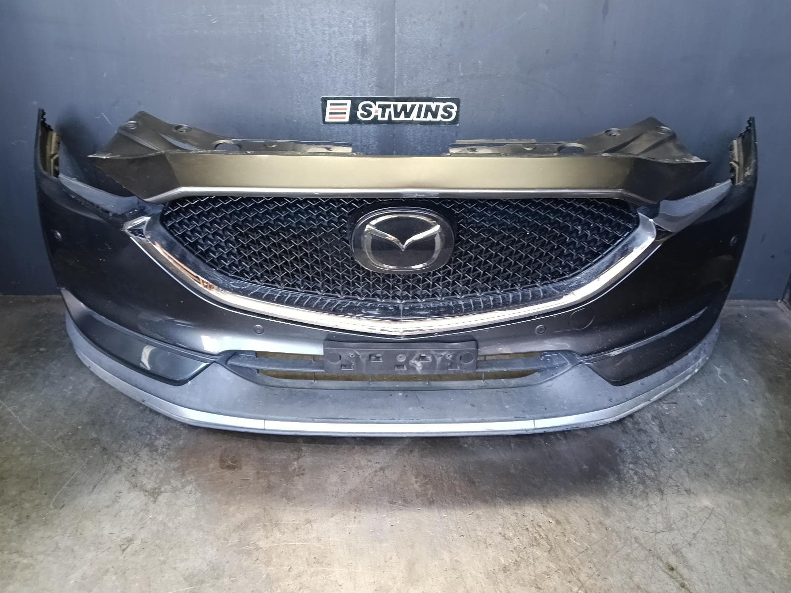 Used auto part listing image: 2017 MAZDA CX5 FRONT BUMPER BUMPER BAR, NON H/LAMP WASHER, W/ 4 PARK SENSOR TYPE, KF, 02/17-08/21