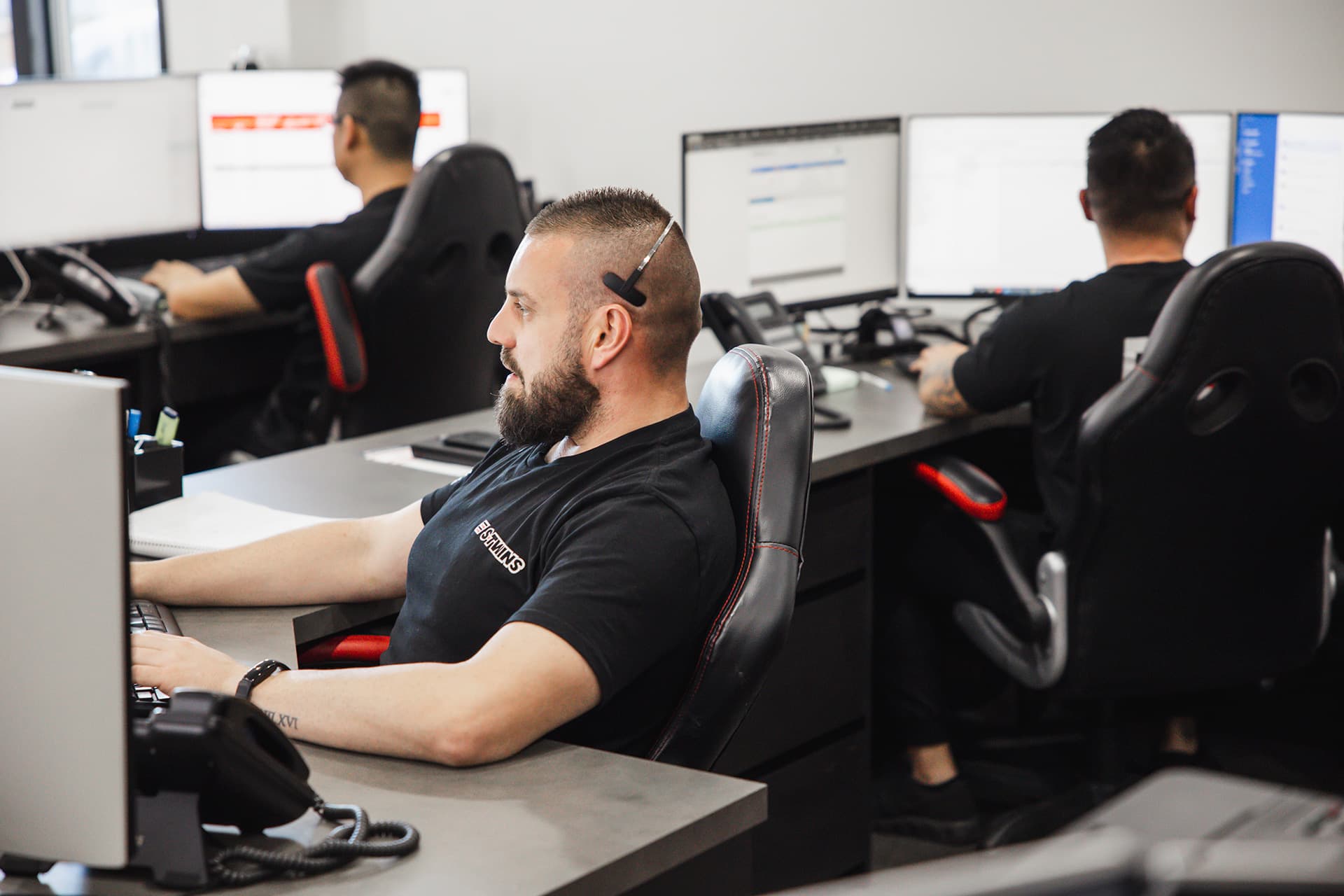 S-Twins resolution center hero banner showing a vehicle service bay