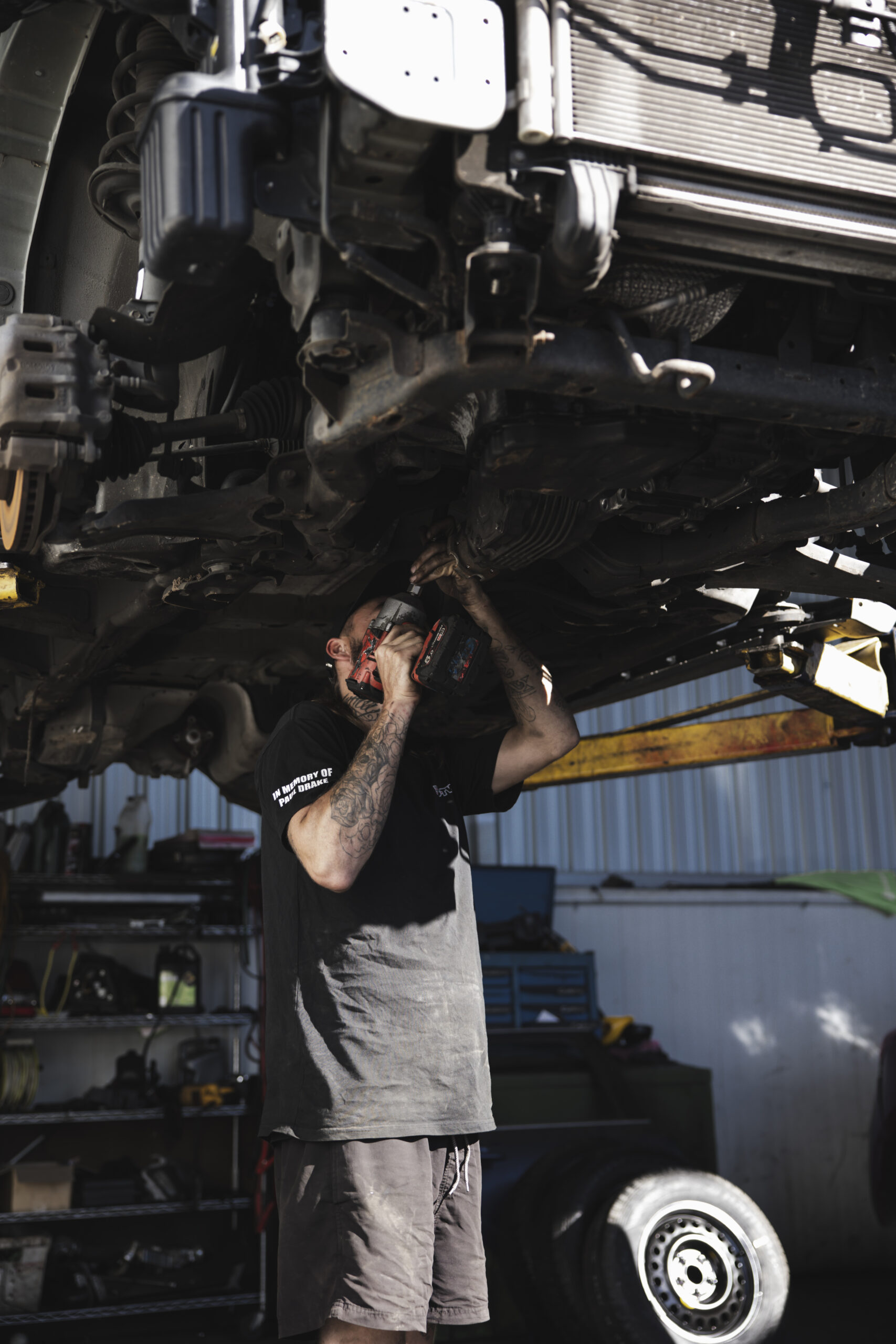 Mechanic Working on Car